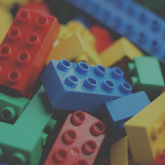 A pile of colorful building blocks

Description automatically generated